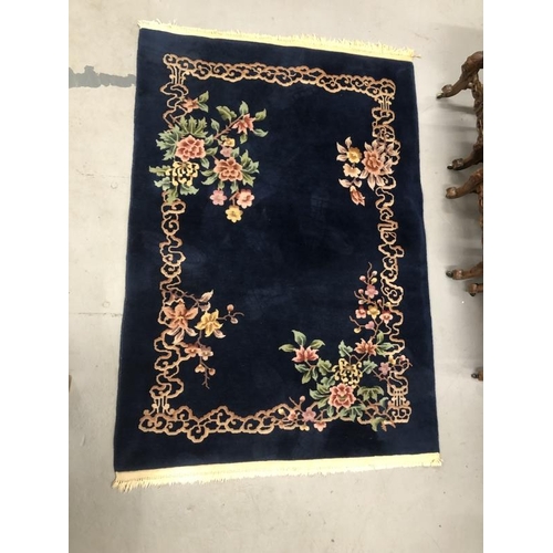 14 - Carpets & Rugs: Chinese hand wash blue ground, floral decoration in reds, greens, ivories and browns... 