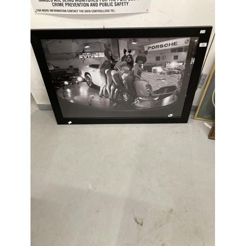 145 - Automobilia: Signed black and white poster of Bunny Girls alongside an Aston Martin Volante at the 1... 