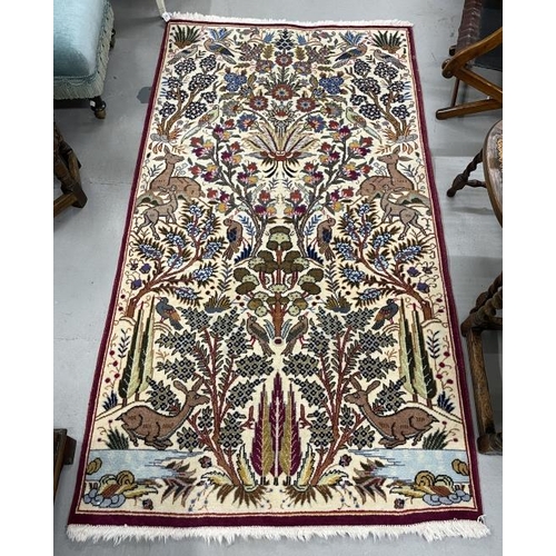 15 - Carpets: 20th cent. Persian rug with animal and bird motifs. 79ins. x 42ins.