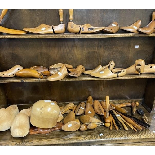 2 - Treen: Cobblers shoe lasts, glove stretchers and a hat block. Approx. 40 items.