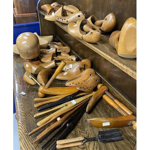 2 - Treen: Cobblers shoe lasts, glove stretchers and a hat block. Approx. 40 items.