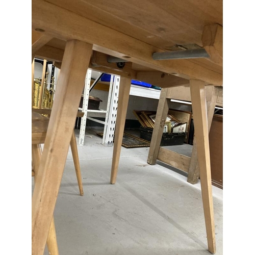 20A - Mid 20th cent. Ercol ash oval drop leaf table and four model 391 stick back chairs with sticks exten... 