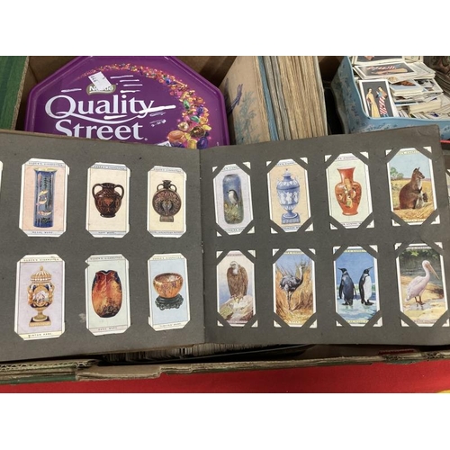 211 - Cigarette Cards: Thousands of loose cards, some rare issues, two fully populated loose albums, ten m... 