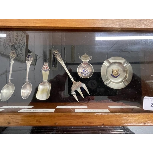 264 - Royal Navy/Militaria: A collection of enamel ships spoons and ashtrays most notably HMS Hood pickle ... 