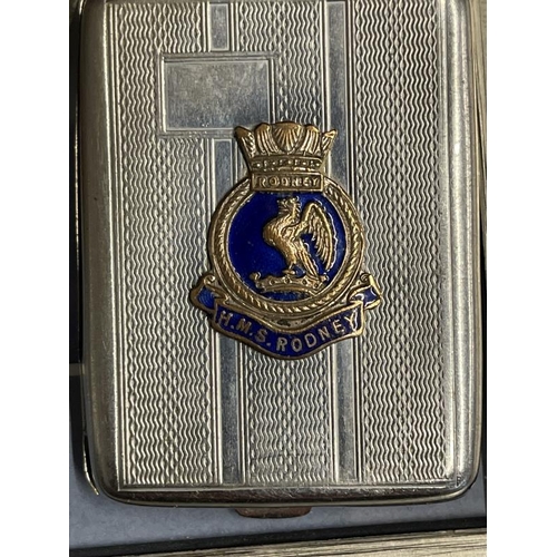 275 - Militaria/Royal Navy: H.M.S. Rodney sweetheart pendant, Vesta case and good luck horseshoe, framed. ... 