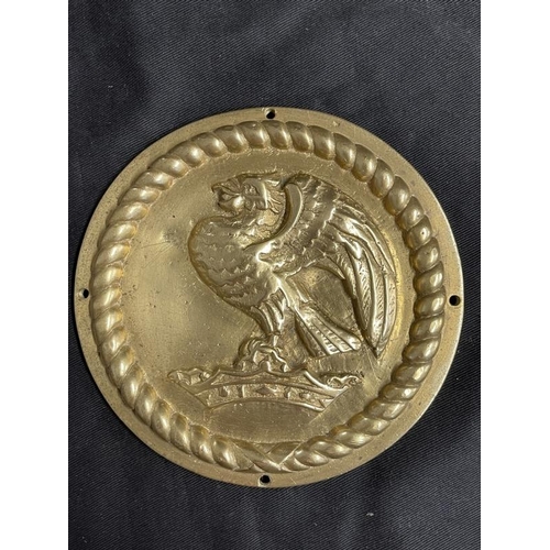 278 - Militaria: A cast H.M.S. Rodney 6ins Tampion central device surrounded by rope grommet border mounte... 