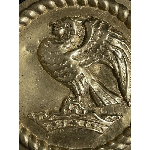 278 - Militaria: A cast H.M.S. Rodney 6ins Tampion central device surrounded by rope grommet border mounte... 