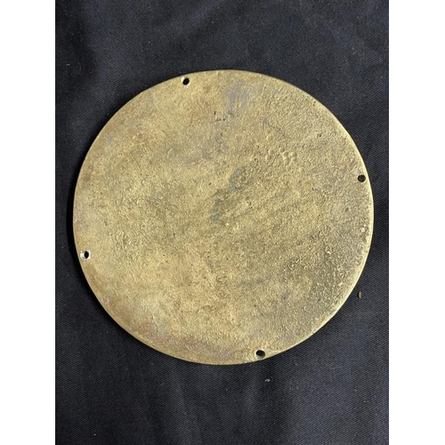 278 - Militaria: A cast H.M.S. Rodney 6ins Tampion central device surrounded by rope grommet border mounte... 