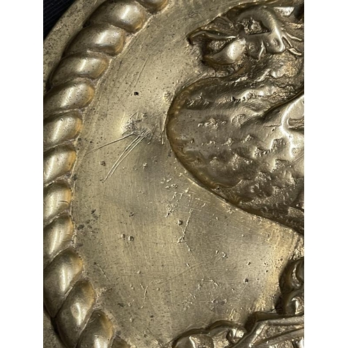 278 - Militaria: A cast H.M.S. Rodney 6ins Tampion central device surrounded by rope grommet border mounte... 