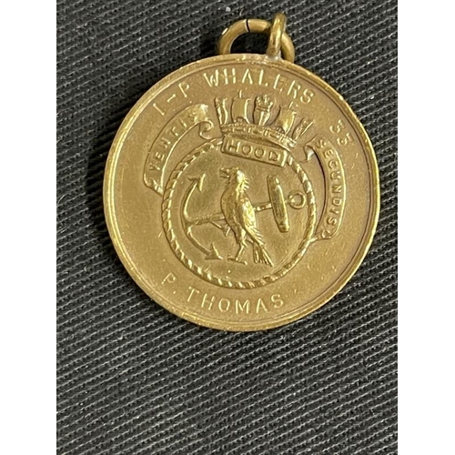 279 - Militaria/Royal Navy: H.M.S. Hood copper ashtray, penknife, Hood Whalers Club medal. (3)