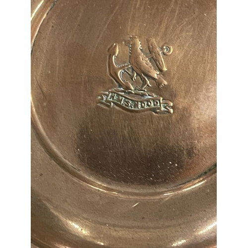 279 - Militaria/Royal Navy: H.M.S. Hood copper ashtray, penknife, Hood Whalers Club medal. (3)