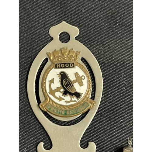281 - Militaria/Royal Navy: H.M.S. Hood enamel and plated bookmark and pin badge.