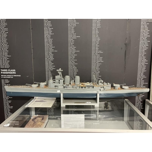 291 - Models: Treen battery powered pond model of H.M.S. Hood. 54ins.