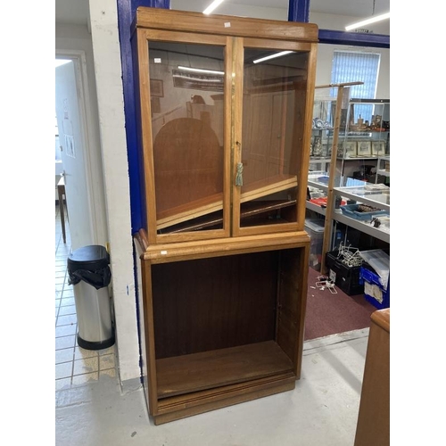 3 - 20th cent. Mahogany glazed top bookcase, two glass doors with three shelves above an open cupboard w... 