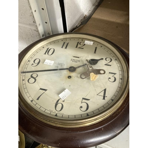 31 - Clocks: Mahogany cased circular wall clock, spring movement, white painted dial, Roman numerals. Dia... 