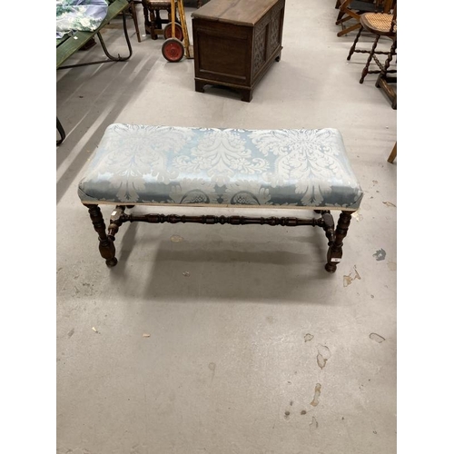 43 - Early 20th cent. Footstool with turned legs joined by a turned stretcher. 40ins. x 18ins.