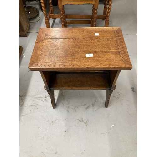 45 - Oak arts and crafts revolving table in style of Heals. 21ins. x 14ins. x 22ins.