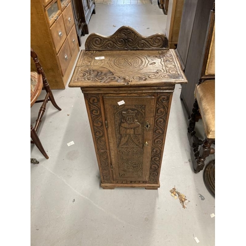 47 - 20th cent. Carved oak pot cupboard, mahogany standard lamp and oval mirror.