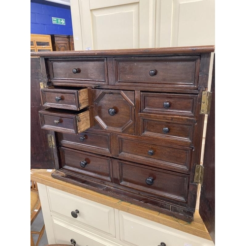 52 - 18th cent. Continental table cabinet with later adaptations, the two doors with arched panels ebony ... 