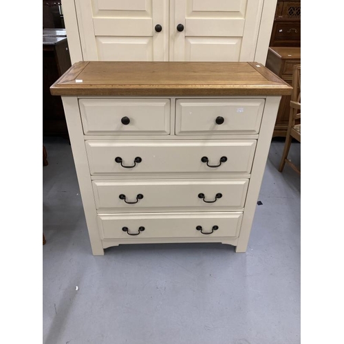 54 - 20th cent. Two door wardrobe with moulded oak cornice above two cream painted doors above a single d... 