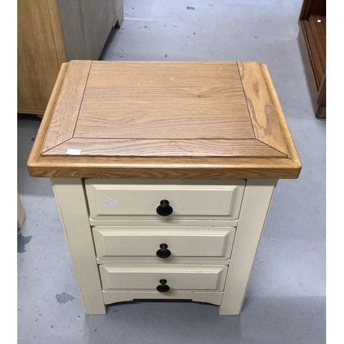 56 - 20th cent. Two door wardrobe with moulded oak cornice above two cream painted doors above a single d... 