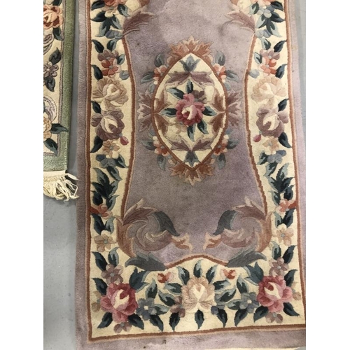 6 - Carpets & Rugs: Chinese hand washed runner, mauve ground, floral decoration in reds, blues, greens a... 