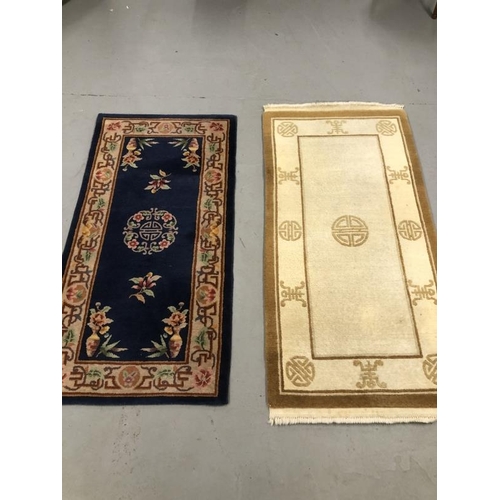 7 - Carpets & Rugs: Two Chinese hand washed rugs, the first ivory ground, happiness motifs in brown, gol... 