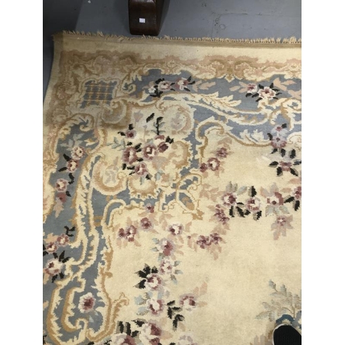 8 - Carpets & Rugs: British made carpet, cream ground with floral decoration, ribbon and garland decorat... 
