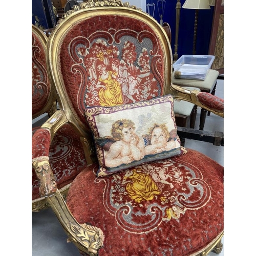 113 - 20th cent. French gilt armchairs, upholstered backs and seats, open arms, a pair. Height 40ins. Widt... 