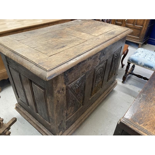 118 - 17th cent. French oak and elm coffer with three panel carved monastery style front. 46ins. x 33ins. ... 