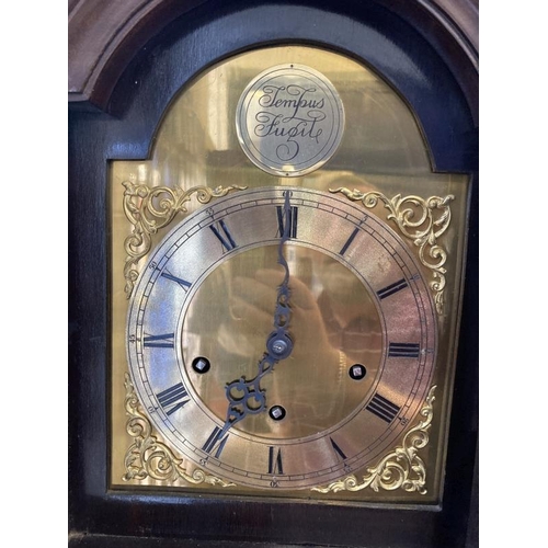 123 - Clocks: 20th cent. Small longcase clock, mahogany case, eight day movement, brass dial.