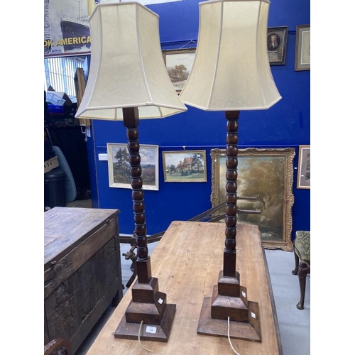 134 - Early 20th cent. Oak lamps bobbin turned columns on square stepped bases  1 x 36ins. and 1 x 35ins. ... 