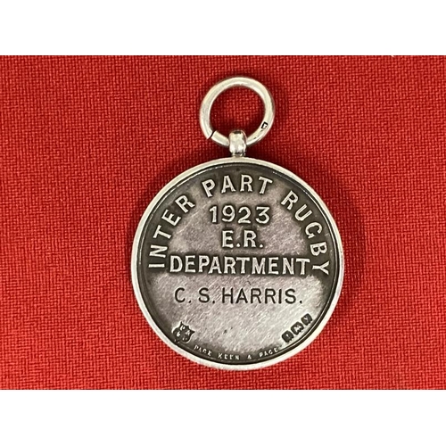 194 - Maritime: Unusual silver hallmarked H.M.S. Hood 1923 Inter Part Rugby Medal.