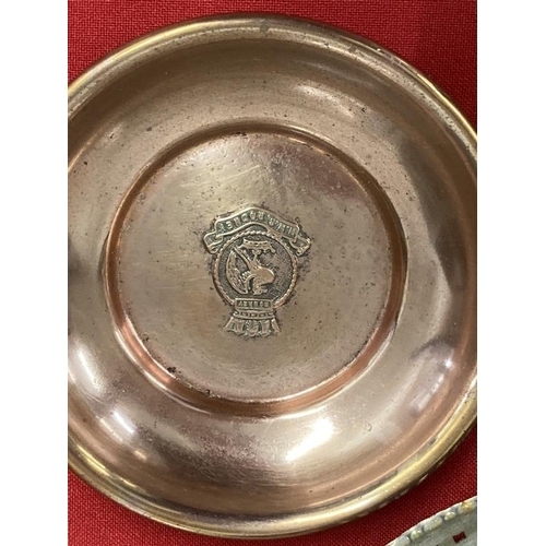 195 - Militaria/Royal Navy: H.M.S. Rodney rum measure, copper ashtray, caddy spoon and oval dish.