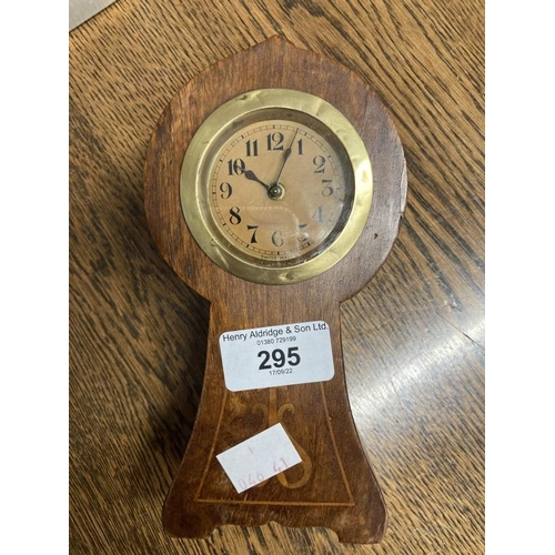 295 - Clocks & Watches: Mantel clock wooden Celtic shaped, Arabic numerals. Height 7ins. Width 3½ins. Pock... 