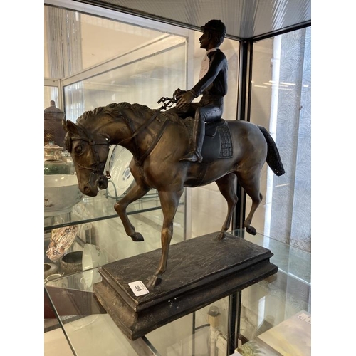 300 - 19th/20th cent. Bronze equestrian statue with jockey up, on cast plinth. Height 18ins.