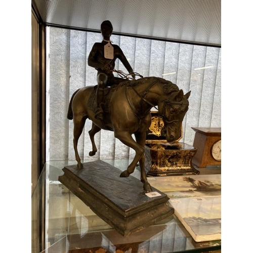 300 - 19th/20th cent. Bronze equestrian statue with jockey up, on cast plinth. Height 18ins.