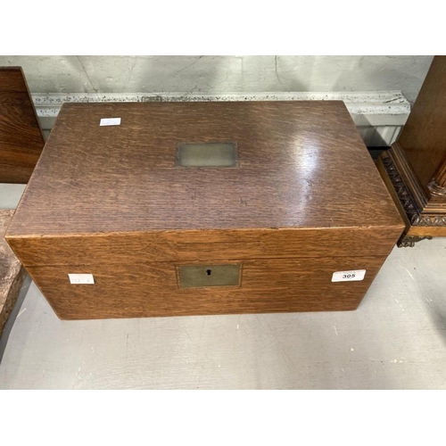 305 - Edwardian oak writing box containing two inkwells, inlaid brass plaque to the top. 16ins. x 9¾ins. x... 