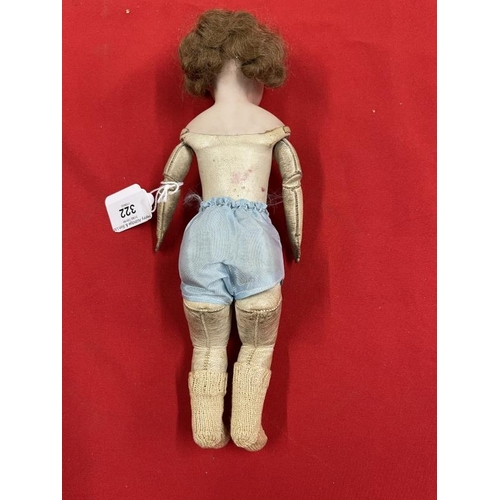 322 - 19th cent. Continental doll, porcelain head, kid leather jointed body, grey glass eyes, closed mouth... 