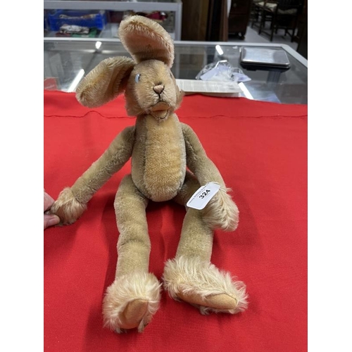 324 - Toys: 20th cent. Steiff plush rabbit, chrome stud right ear. 18ins.