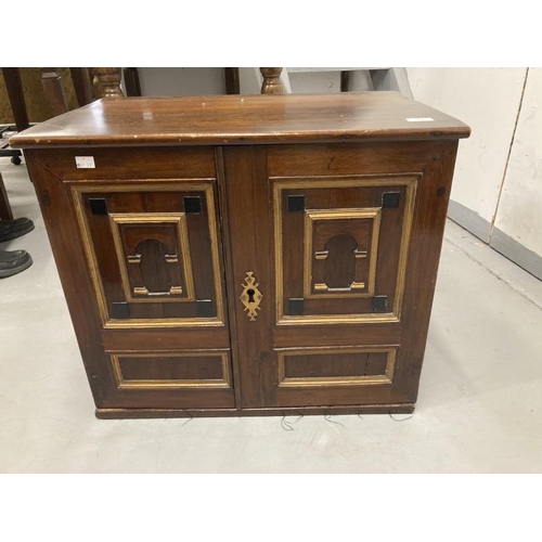 33 - 18th cent. Continental table cabinet with later adaptations, the two doors with arched panels ebony ... 