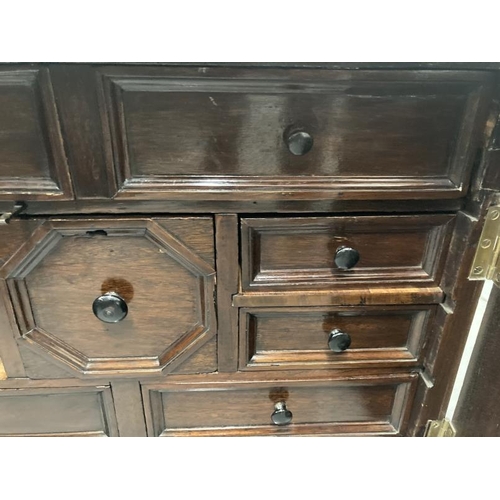 33 - 18th cent. Continental table cabinet with later adaptations, the two doors with arched panels ebony ... 