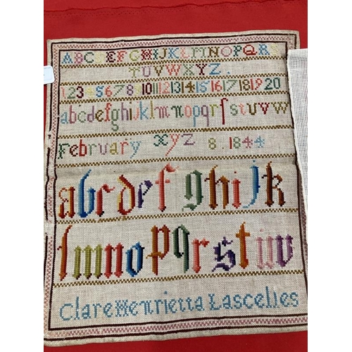 335 - 19th cent. Textiles: Woolwork alphabet sampler by Clare Henrietta Lancelles, Feb. 1844, unframed. 16... 