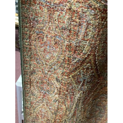 346 - 19th cent. Paisley shawl in shades of green, orange and blue, traditional paisley design. Minor tear... 