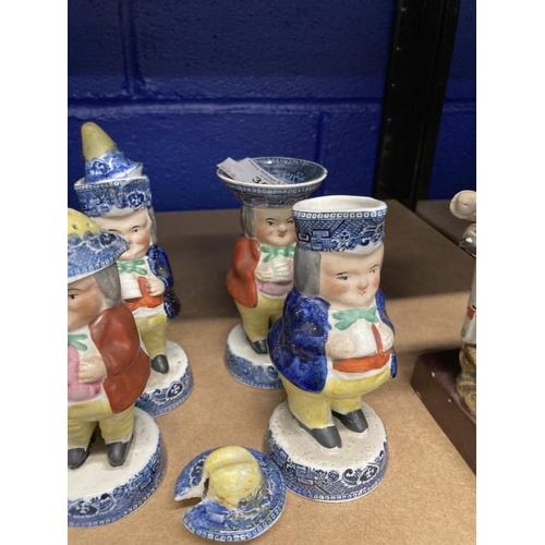 357 - 19th cent. English Staffordshire Toby figural condiments, each figure standing with a mug bordered b... 