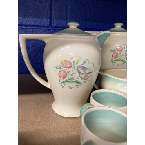 387 - Susie Cooper 1930s coffee set comprising coffee pot, milk jug, teapot, sugar bowl, six cans and sauc... 