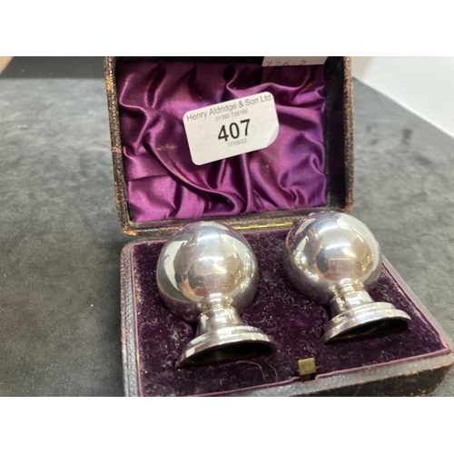 407 - Hallmarked Silver: Boxed pair of salt/pepper condiments, Cornelius Saunders and Frank Shepherd. 1oz.