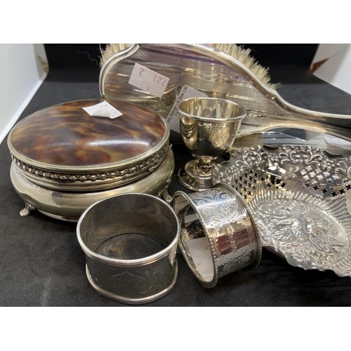 409 - Hallmarked Silver: Two napkin rings and a silver egg cup. 2.3ozt. Hallmarked hand mirror and brush, ... 