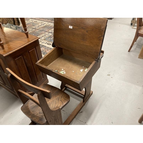 41 - Pre-war oak and elm adjustable flip top child's school desk and bar back chair.
