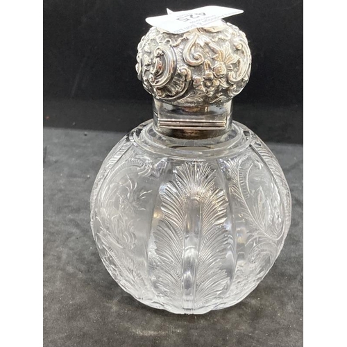 425 - Hallmarked Victorian Silver: Scent bottle in the form of a bulbous engraved glass body with scroll f... 